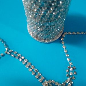 FILO DI STRASS CON BASE COL. ARGENTO